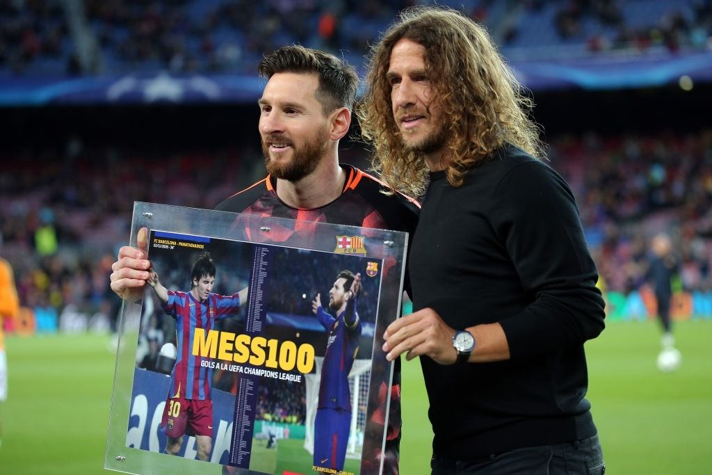 Lionel Messi and Carles Puyol 
