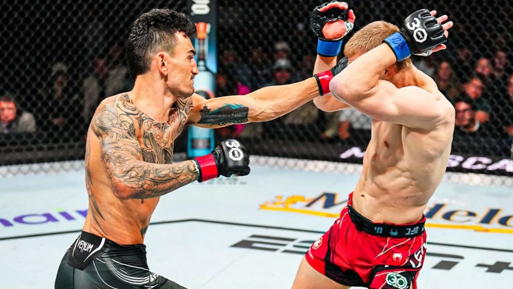 Max Holloway punches Arnold Allen