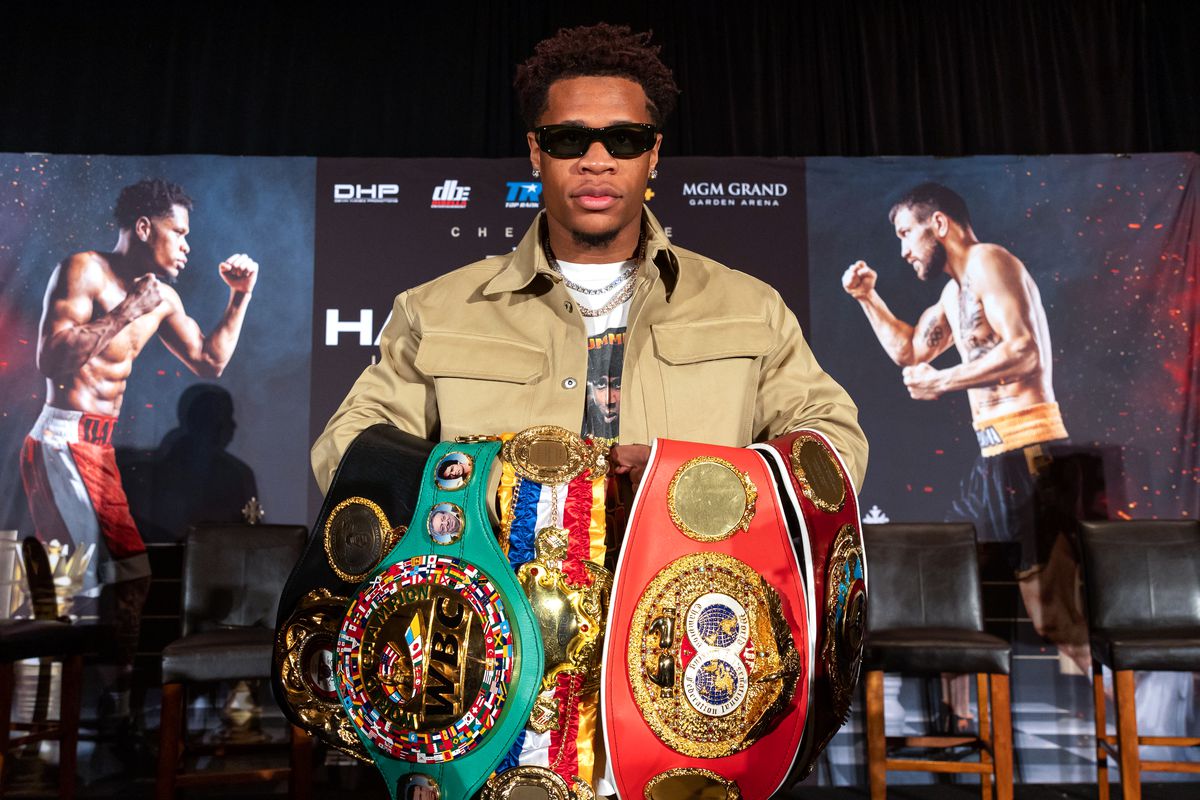 Devin Haney holds his titles