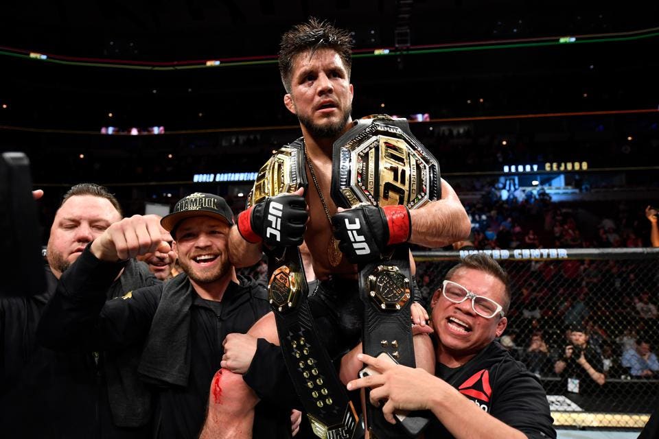 Henry Cejudo celebrating