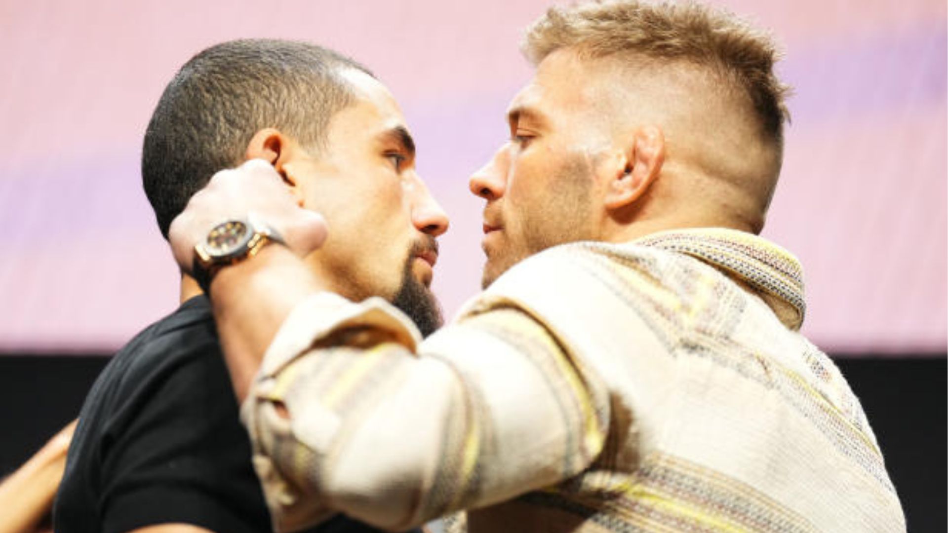 Robert Whittaker and Dricus Du Plessis faceoff